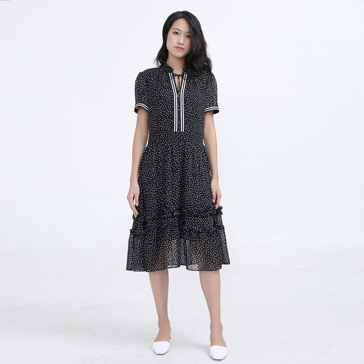 Robe ajustée et évasée en mousseline à pois