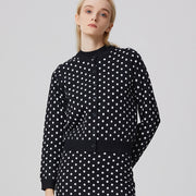 Cardigan tricoté à pois