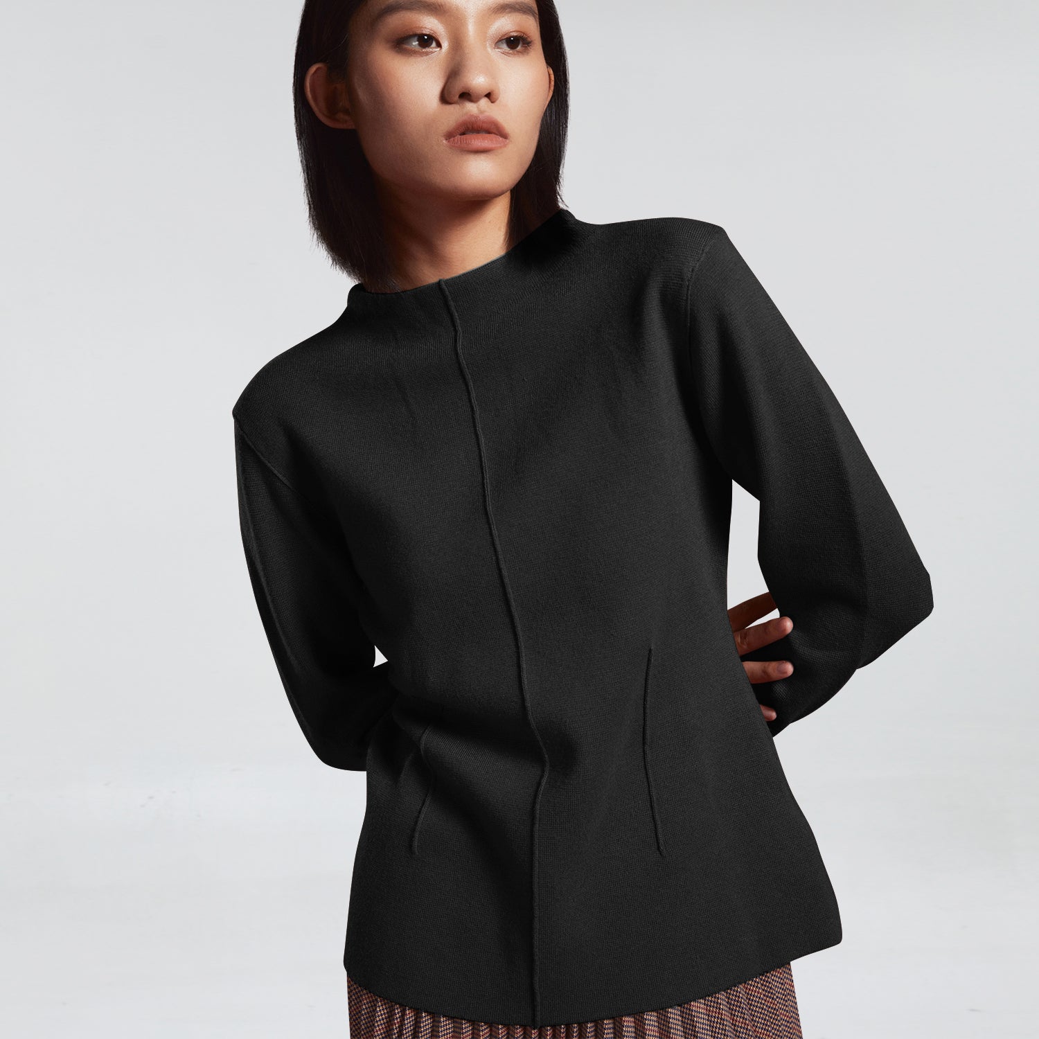 Pull à lignes en relief