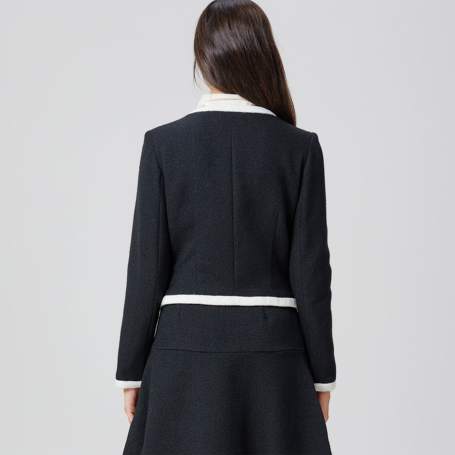 Veste courte à galon contrasté