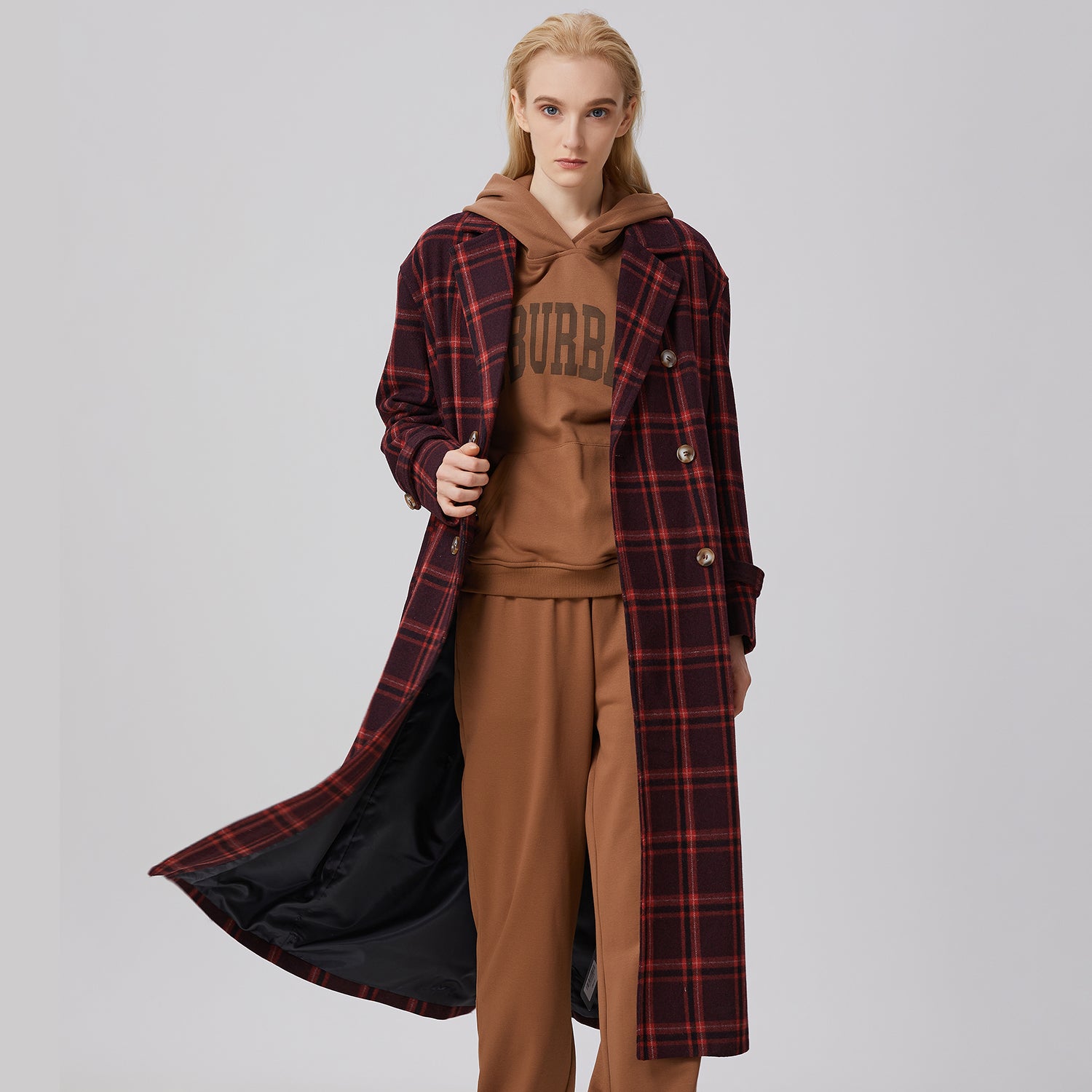 Manteau en laine à carreaux et double boutonnage