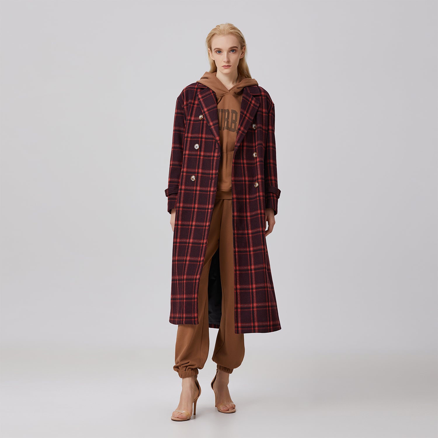 Manteau en laine à carreaux et double boutonnage