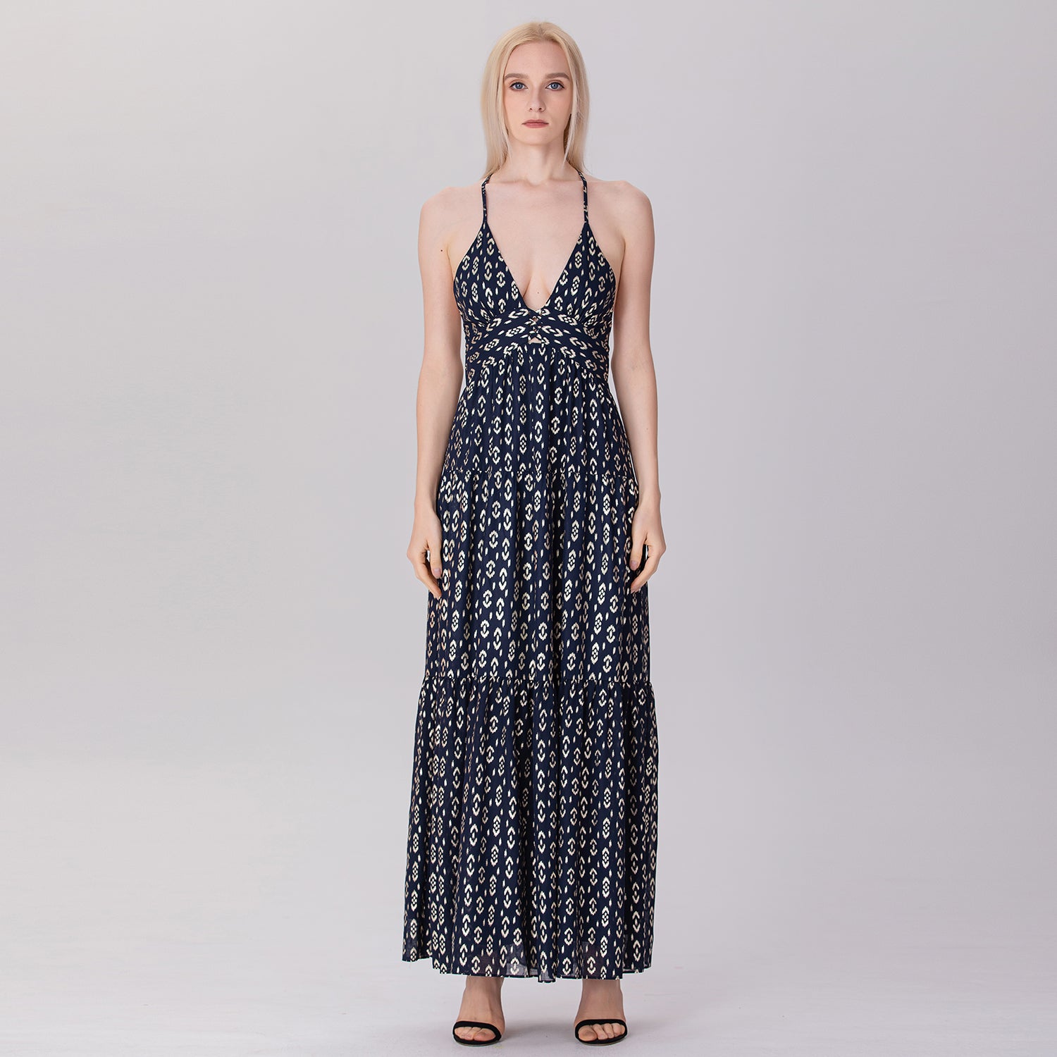Robe longue dos nu à bretelles et empiècements évasés