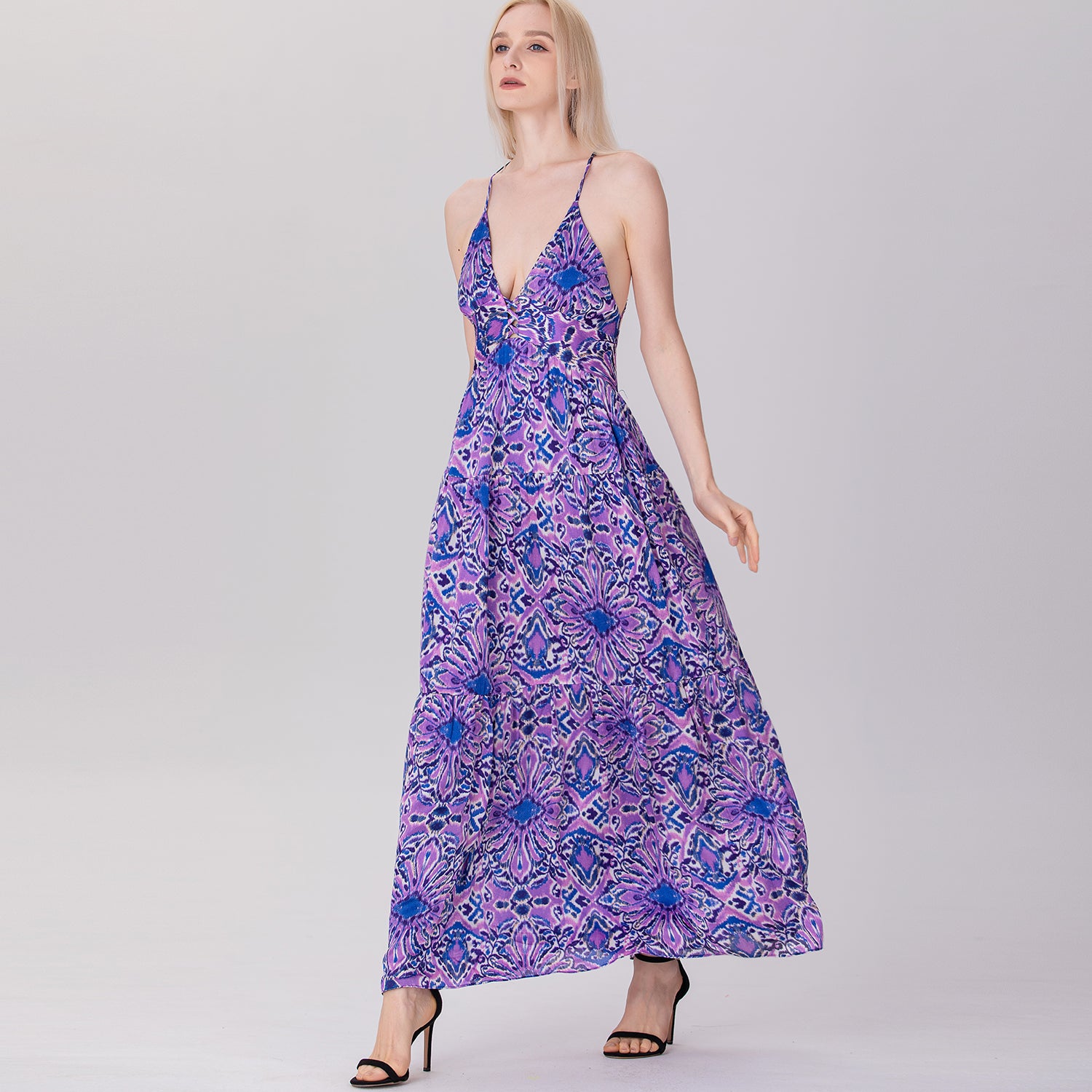 Robe longue dos nu à bretelles et empiècements évasés