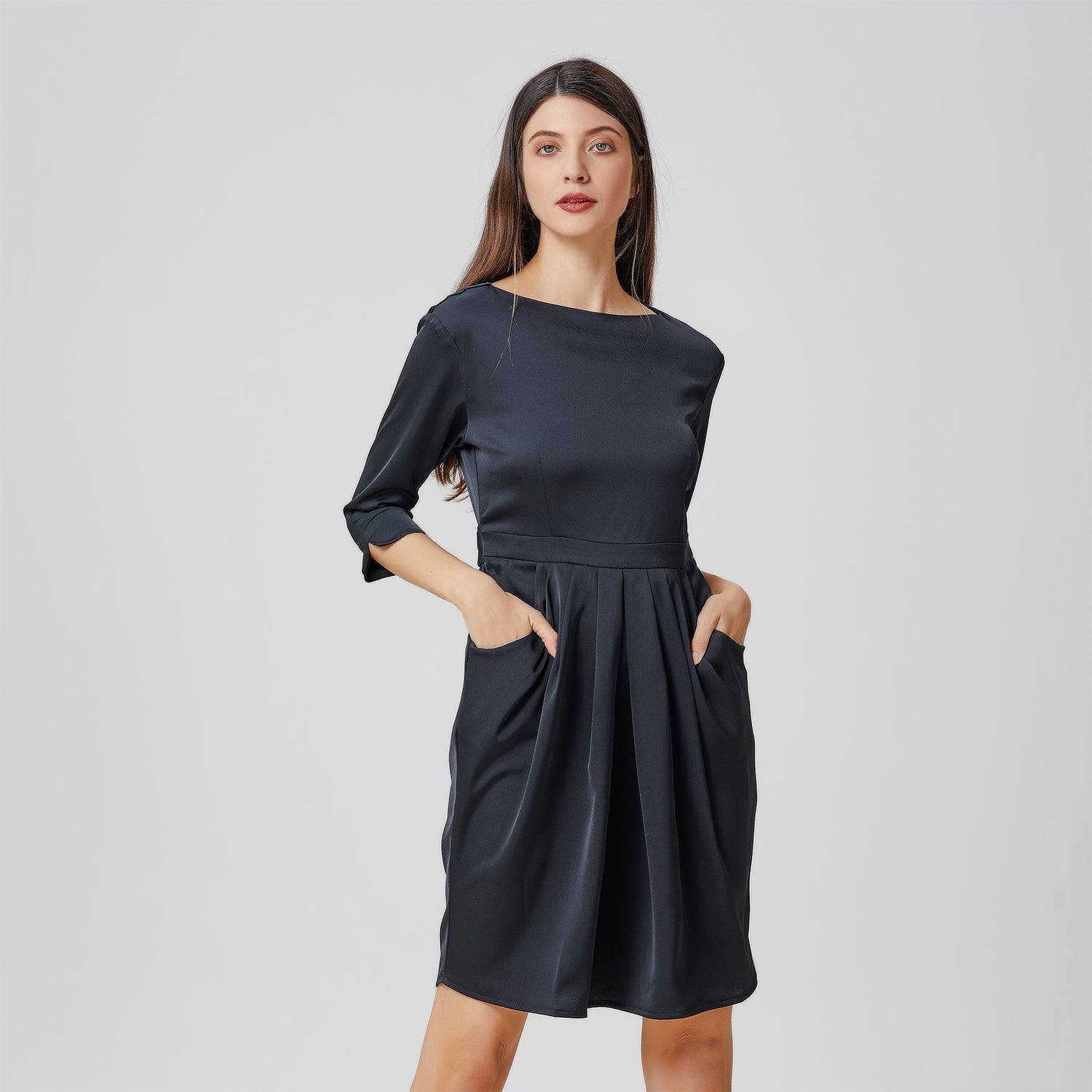 Robe taille soulignée et plis