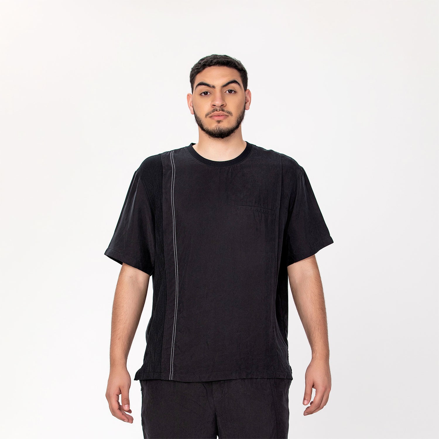 T-shirt à bordure latérale et poche plaquée