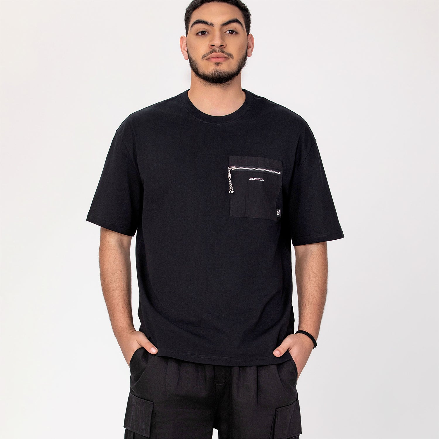 T-shirt homme coupe relax avec poche zippée