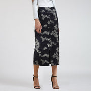 Jupe droite midi au motif floral en denim