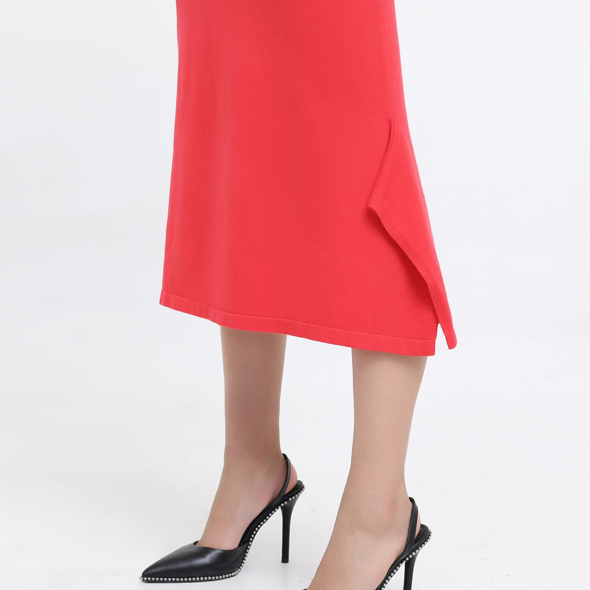 Robe ajustée en maille col V et basques cotés