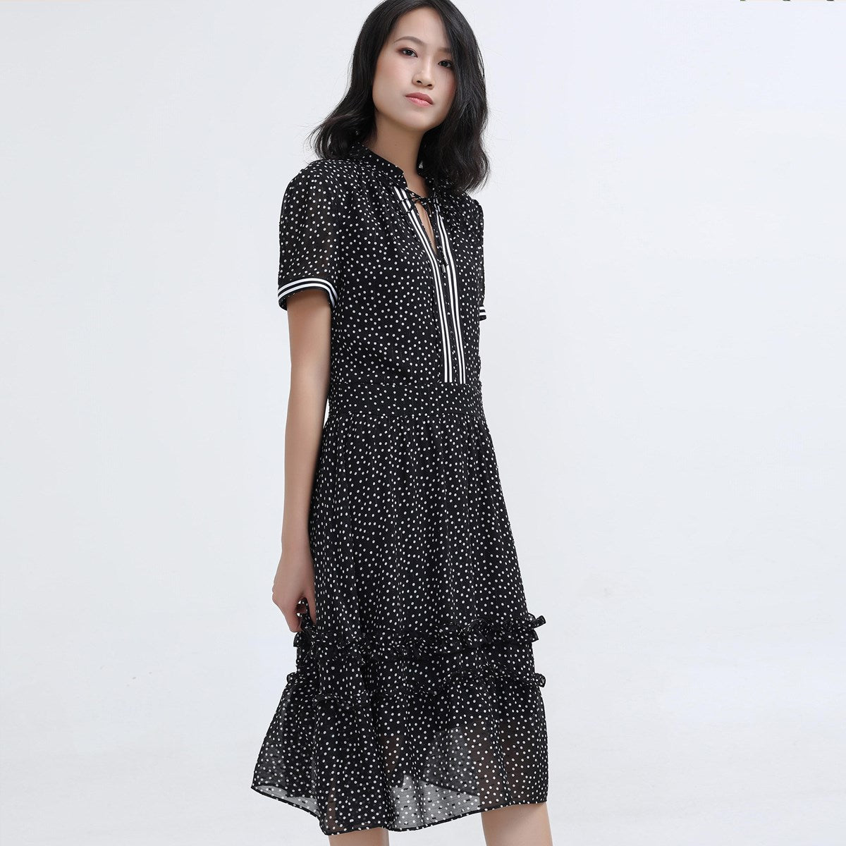 Robe ajustée et évasée en mousseline à pois