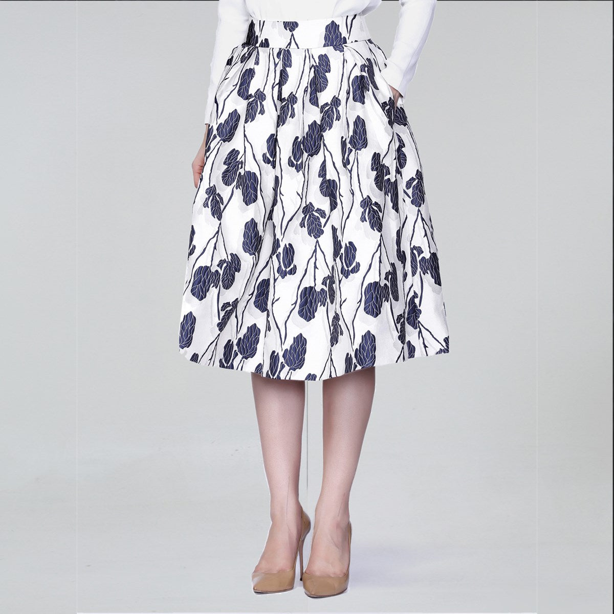 Jupe mi-longue bouffante en jacquard fleuri