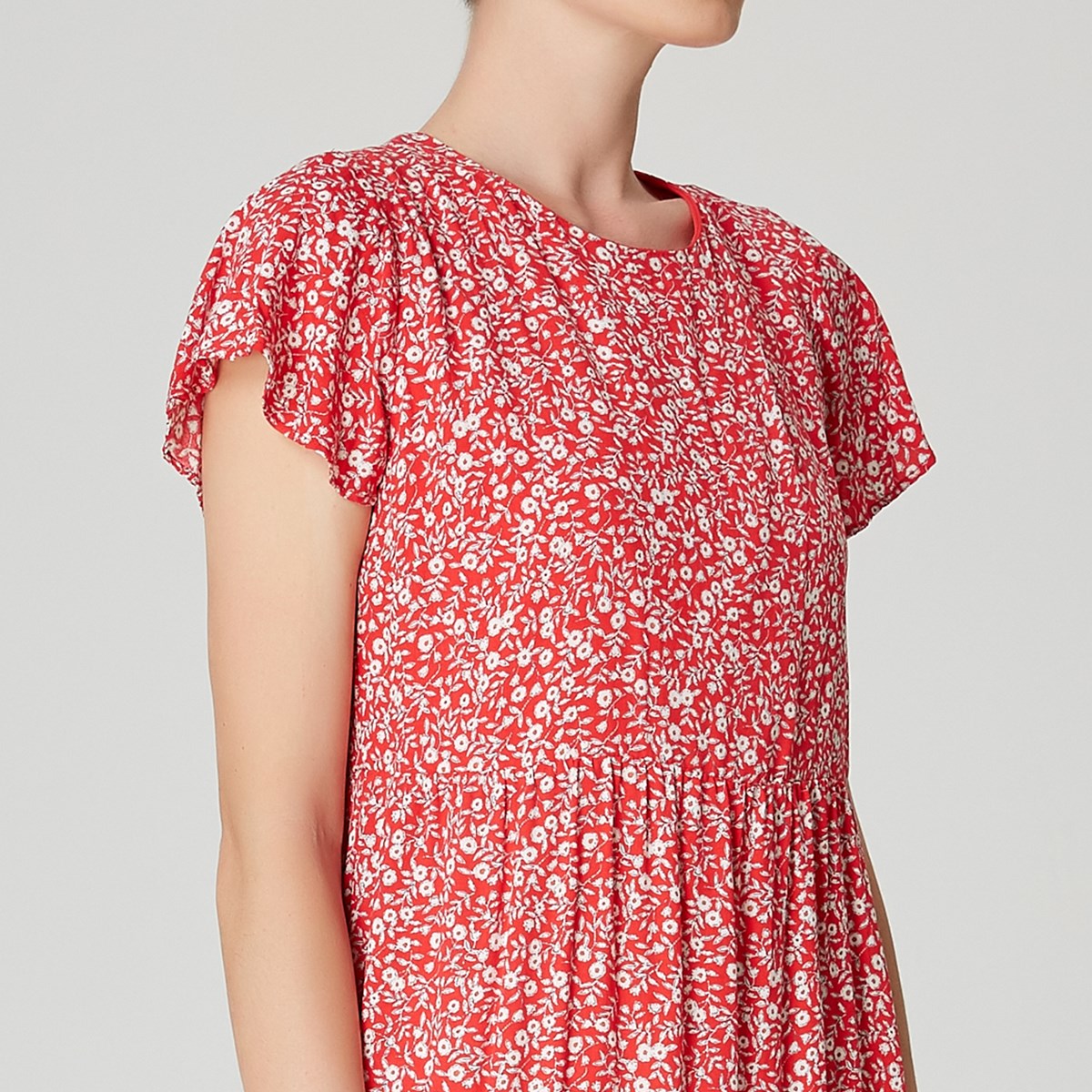 Robe tunique ample à imprimé floral et échancrure dos