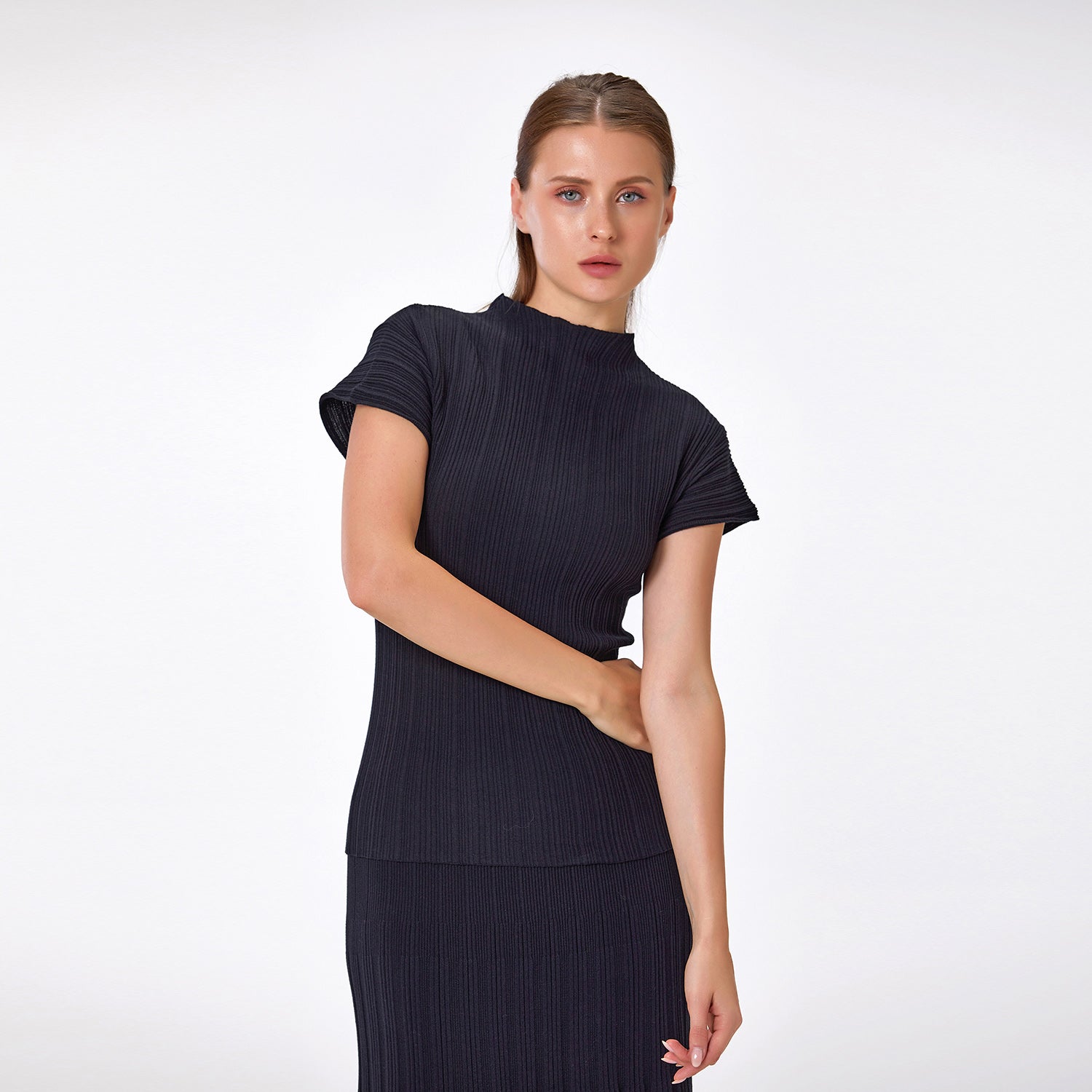 Top tricoté en coton à col montant