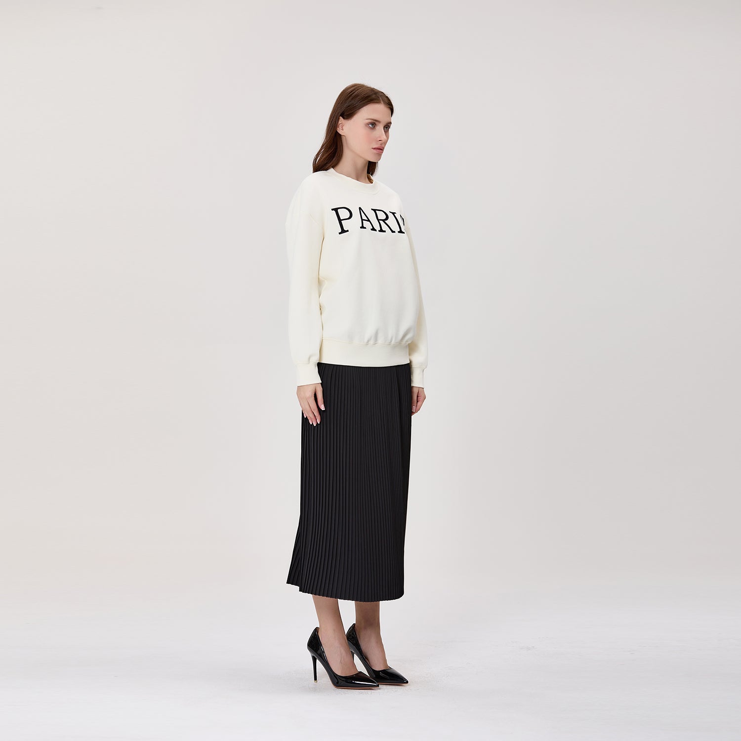 Jupe midi plissée avec taille effet cuir