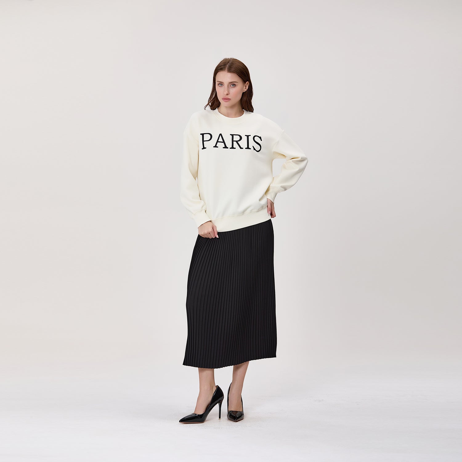 Jupe midi plissée avec taille effet cuir