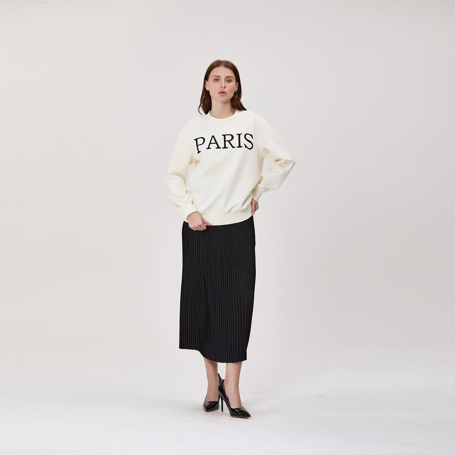 Jupe midi plissée avec taille effet cuir
