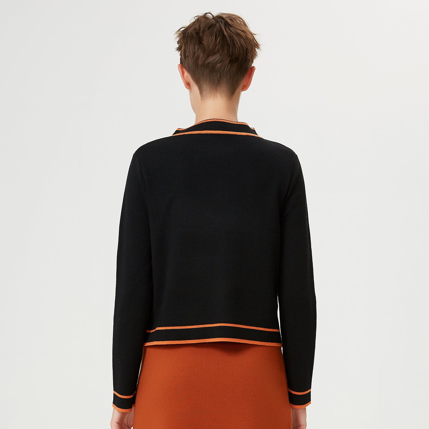 Veste courte maille à liseré contrasté