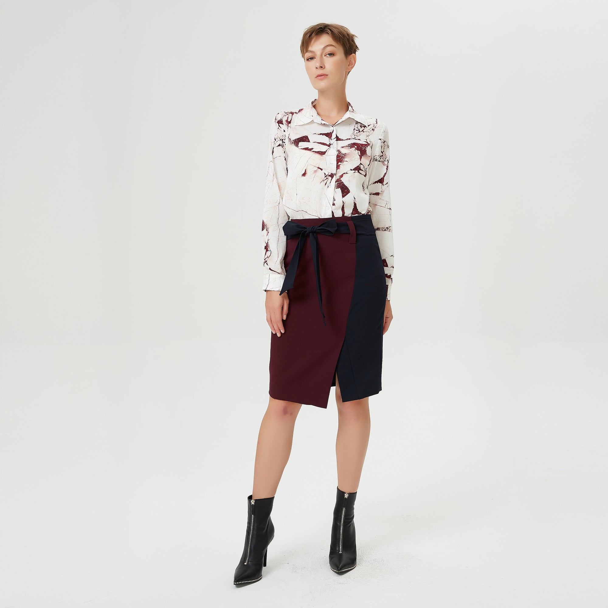 Jupe asymétrique bi-matières à ceinture nouée