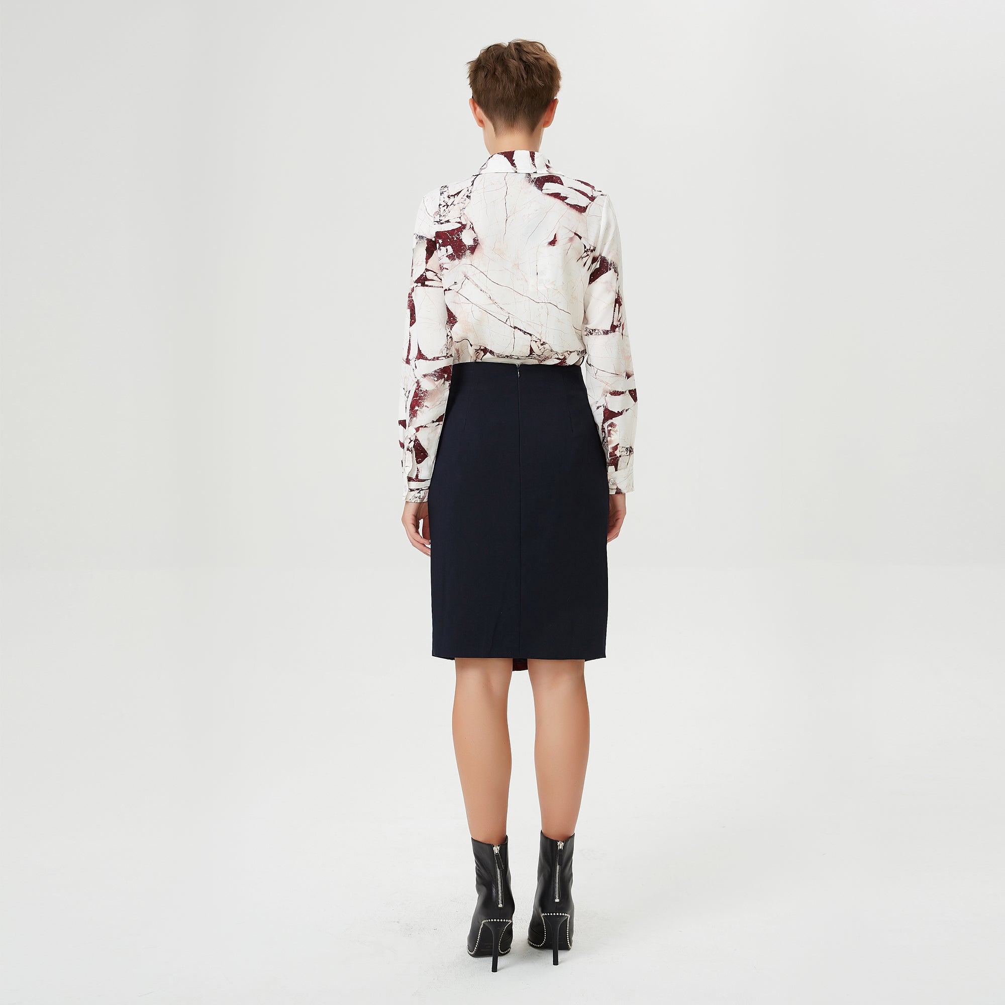 Jupe asymétrique bi-matières à ceinture nouée