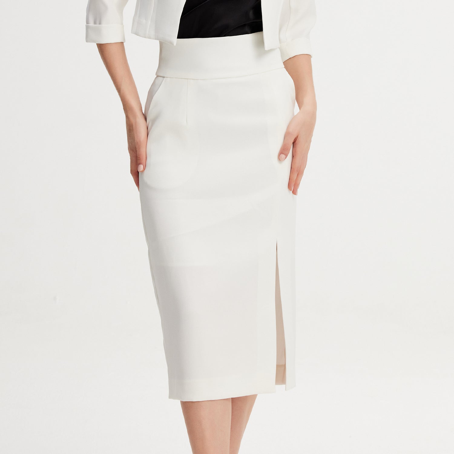 Jupe tailleur crayon fendue devant