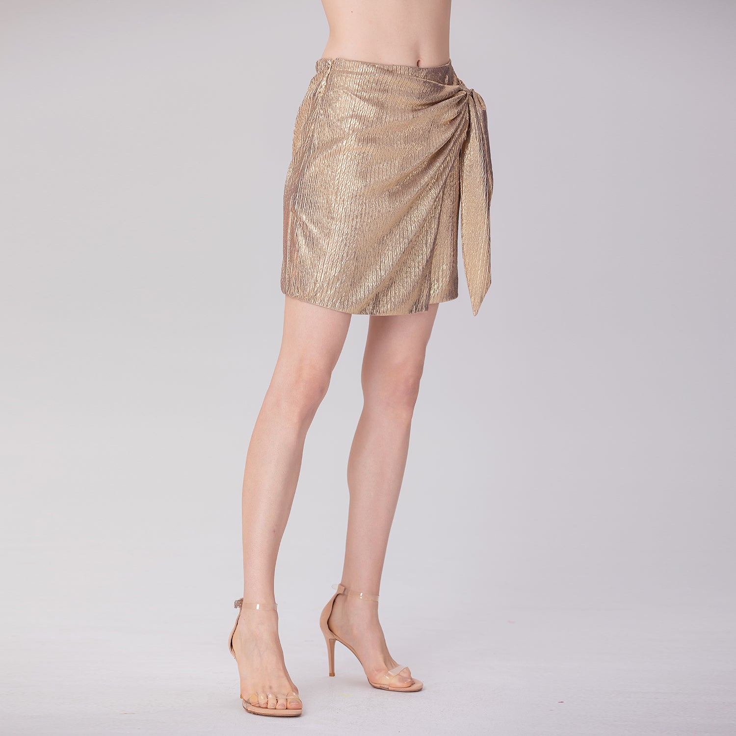 Jupe courte drapée métallisée