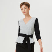Top péplum bi-matière à effet cache-coeur et ceinture appliquée