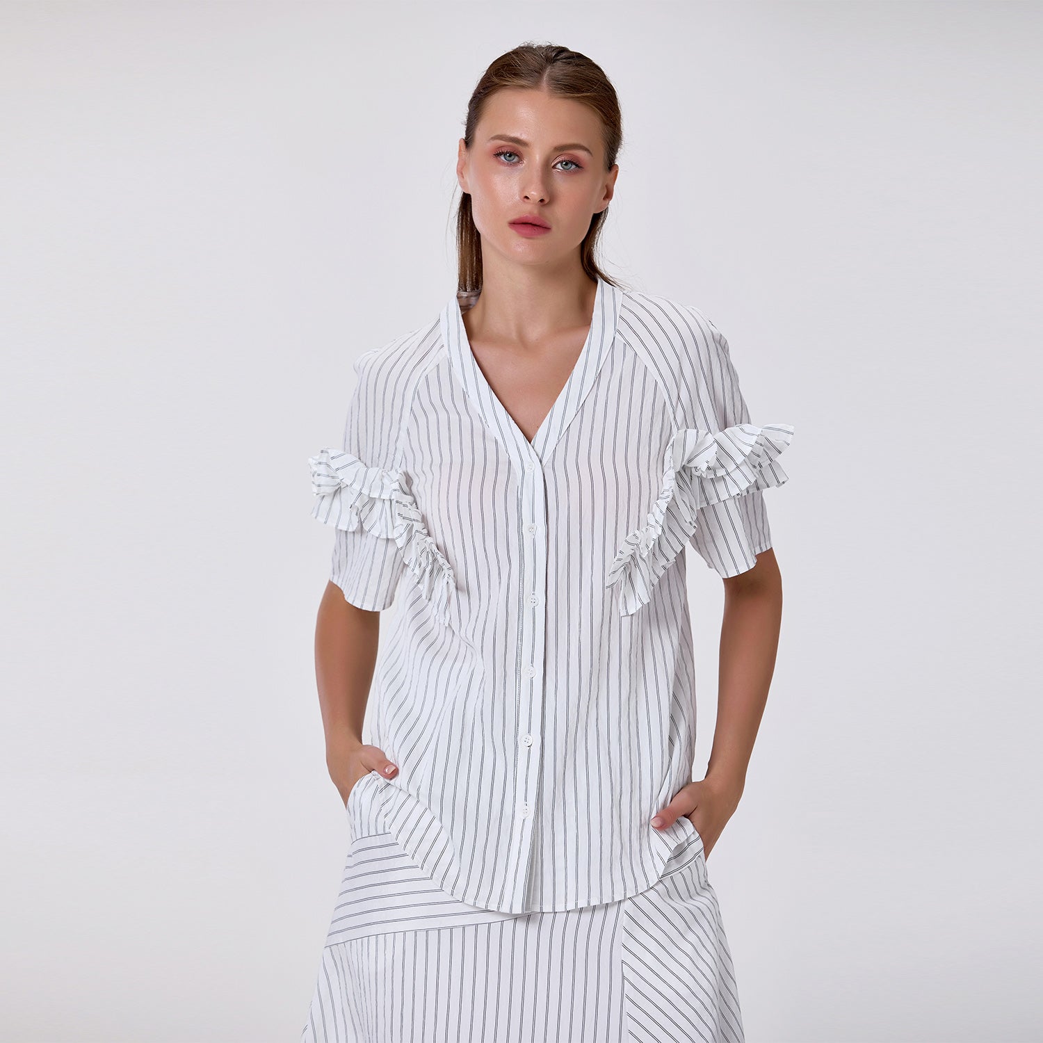 Blouse fluide à volants et col V