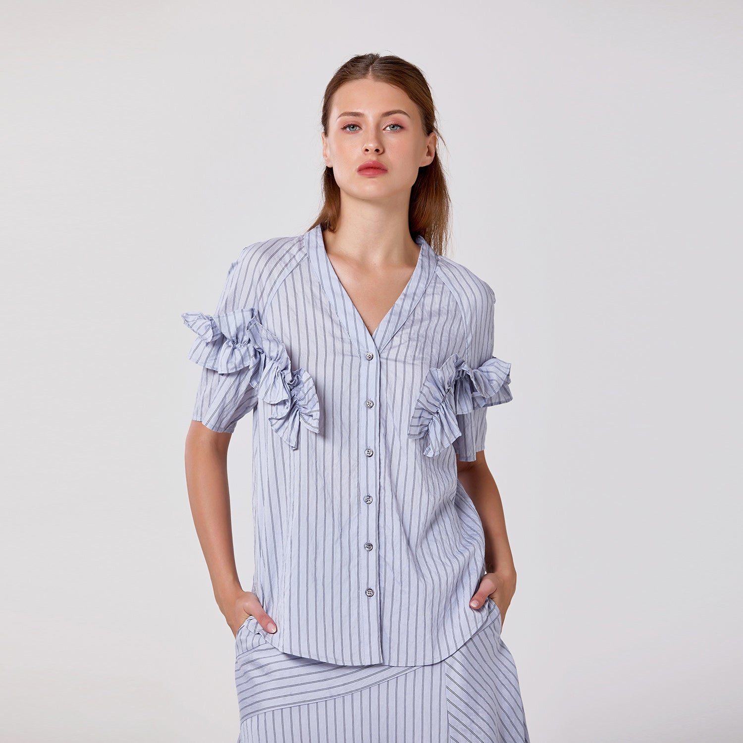 Blouse fluide à volants et col V