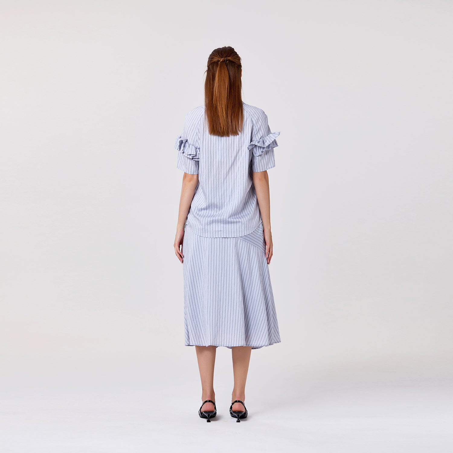 Blouse fluide à volants et col V