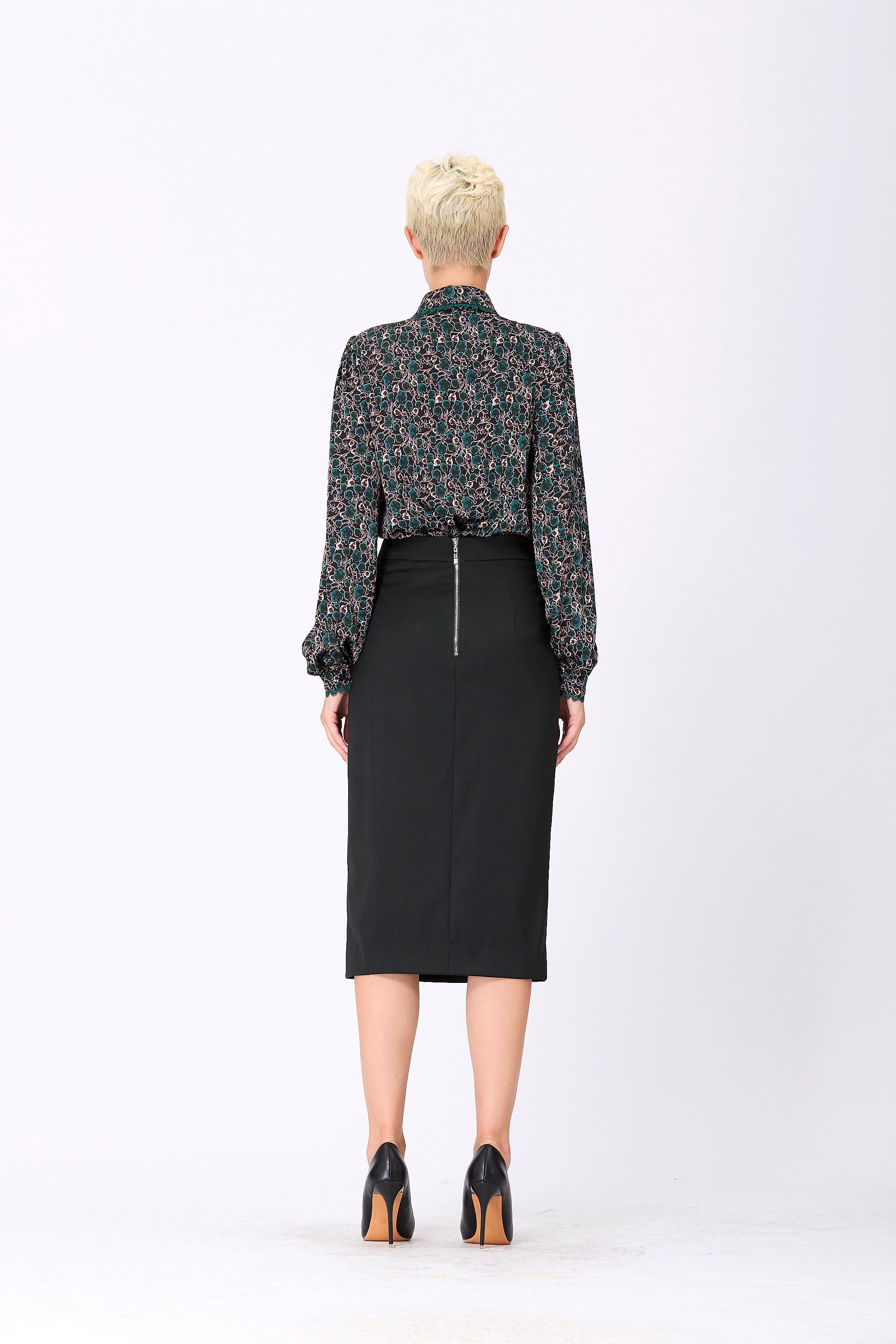 Jupe crayon asymétrique à volants et fente