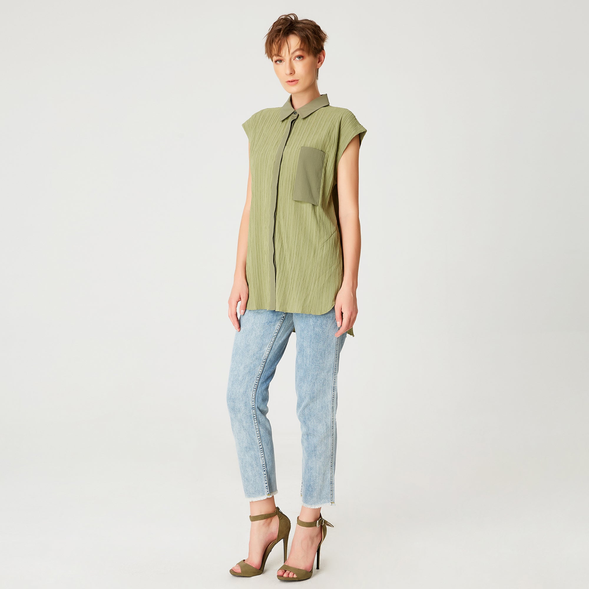 Chemise sans manche à poche plaquée