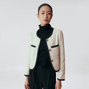Veste courte contrastée de liserés