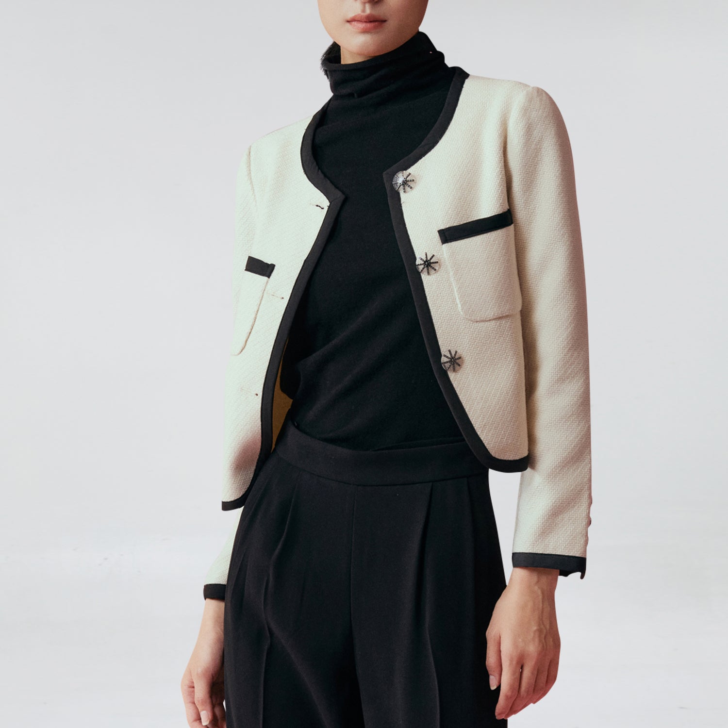 Veste courte contrastée de liserés