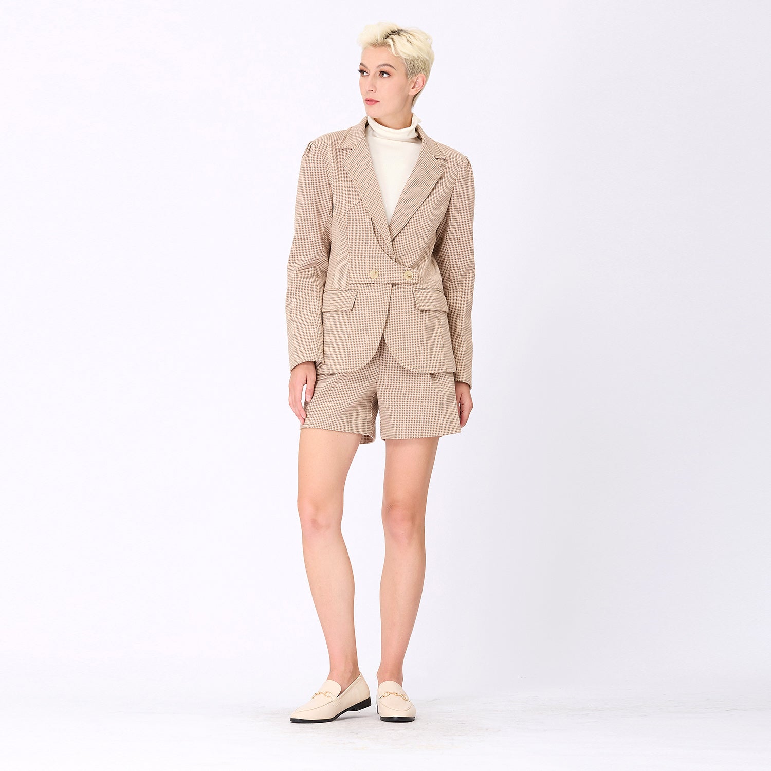 Veste motif pied-de-poule à patte boutonnée