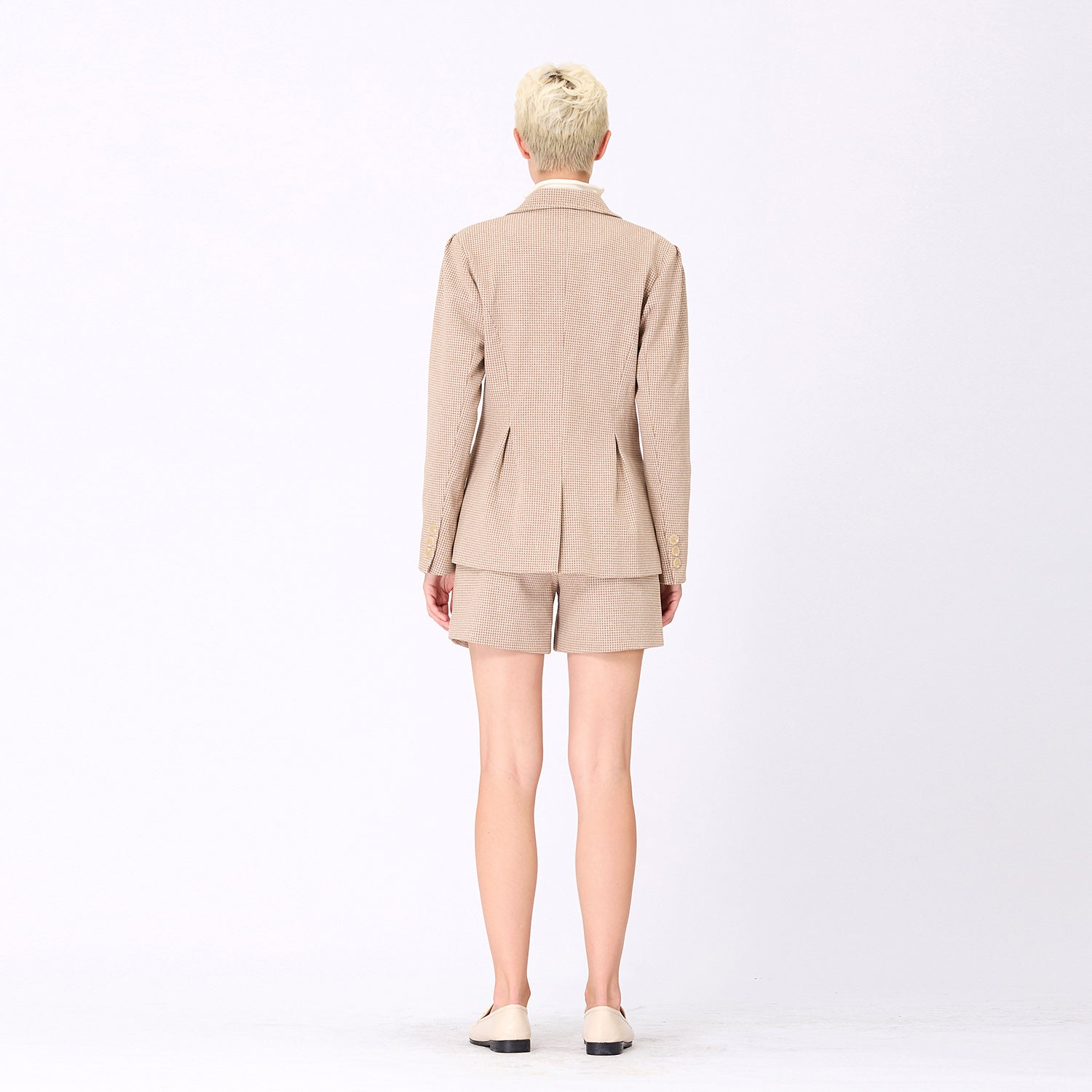 Veste motif pied-de-poule à patte boutonnée
