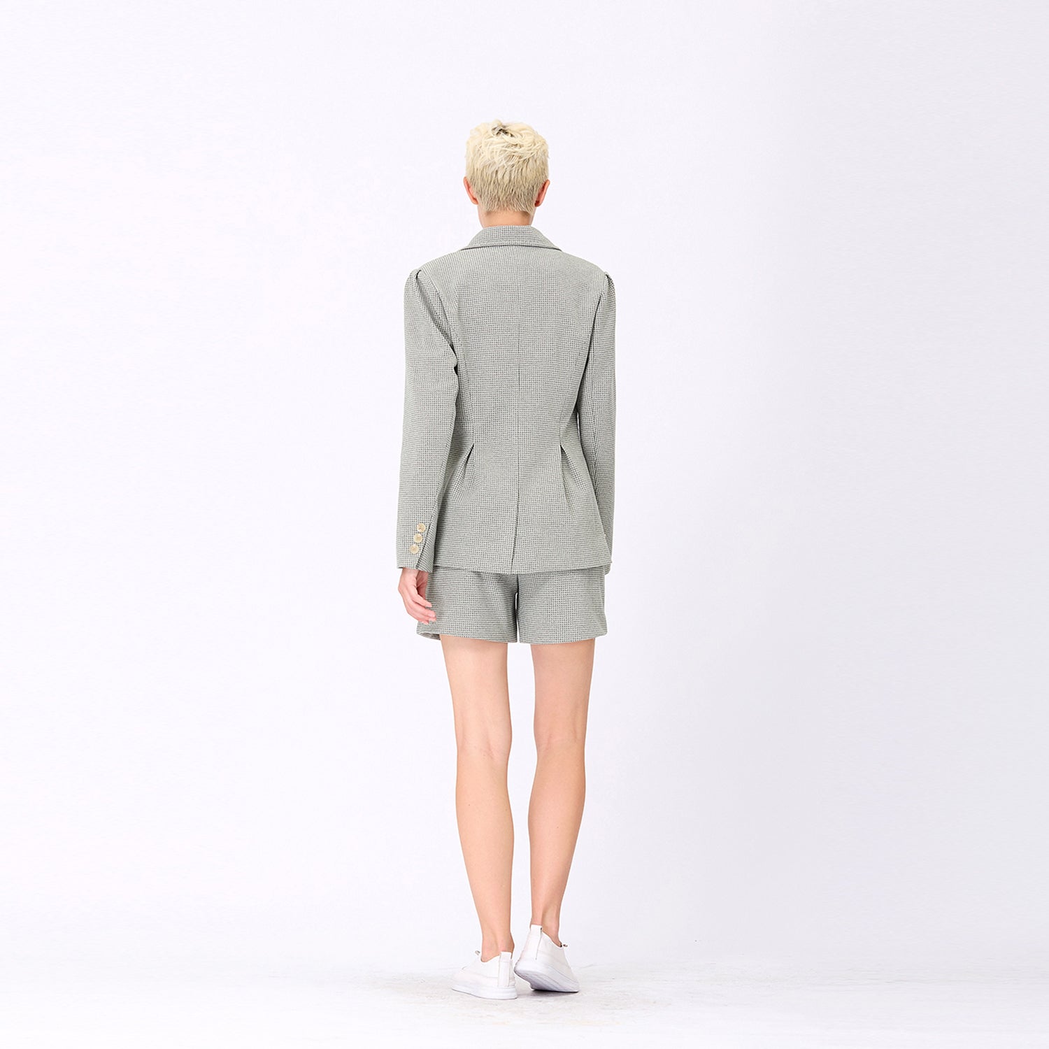 Veste motif pied-de-poule à patte boutonnée