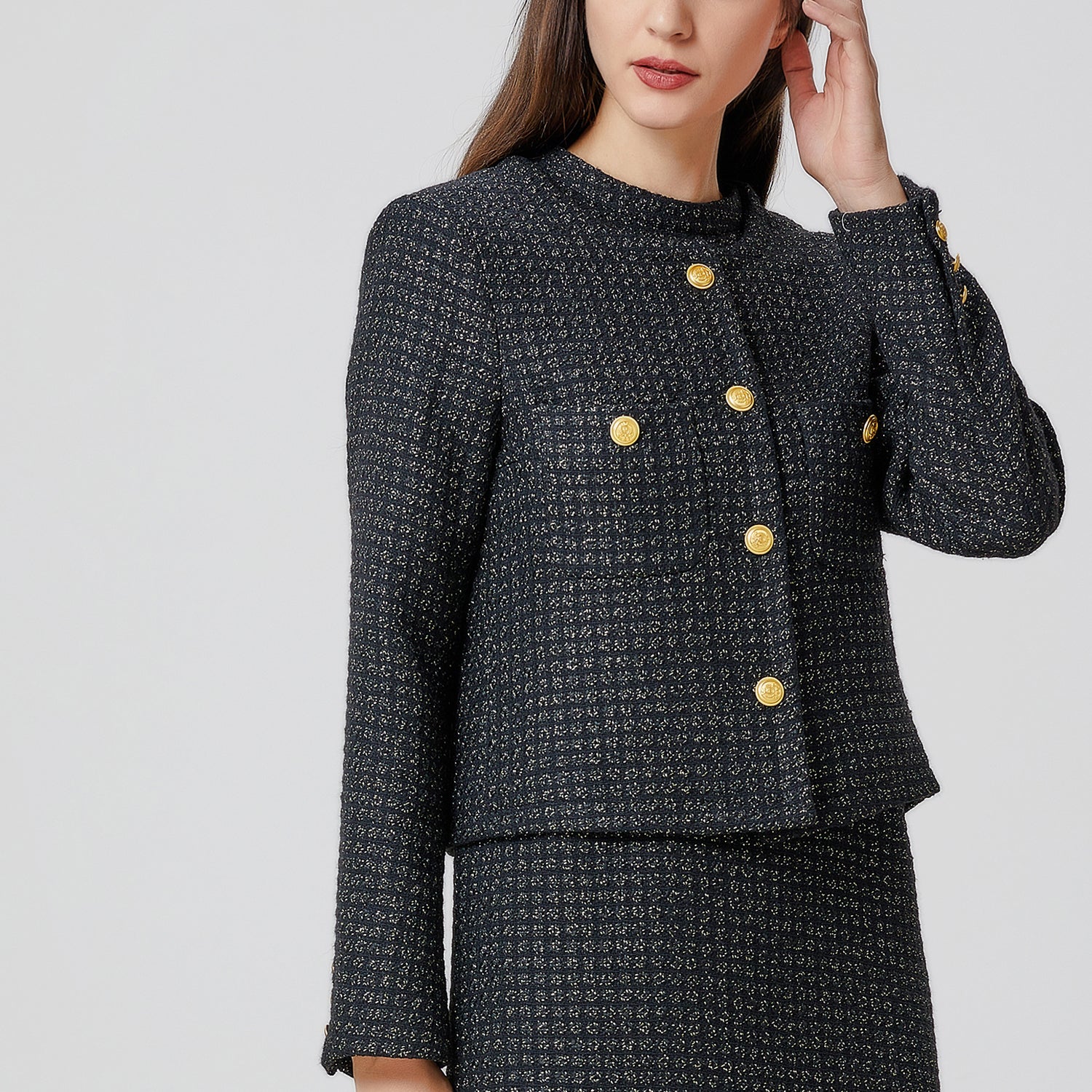 Veste tweed à boutons dorés