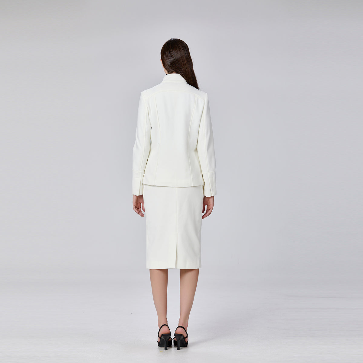 Veste minimaliste à col haut et poches plaquées