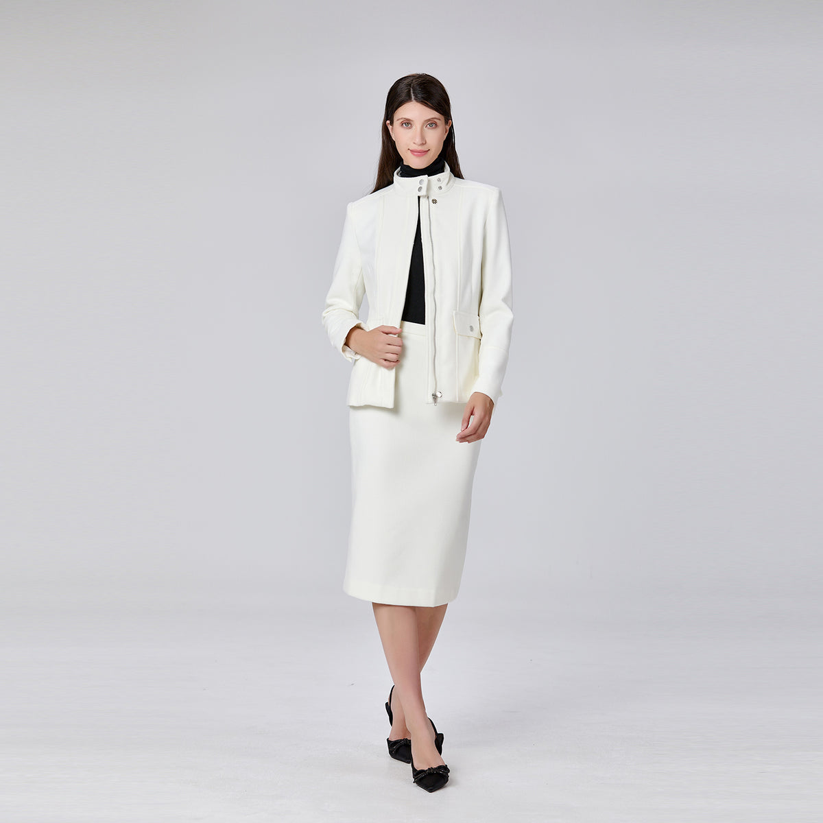 Veste minimaliste à col haut et poches plaquées