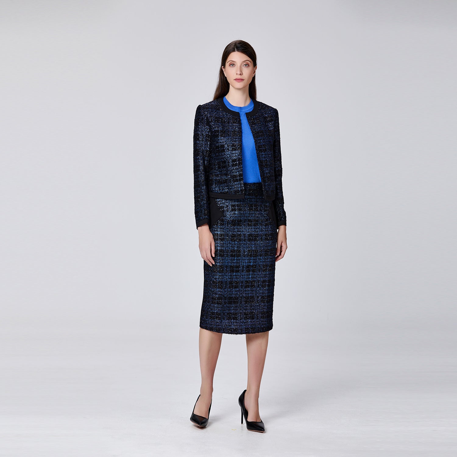 Veste courte minimaliste à motif carreaux