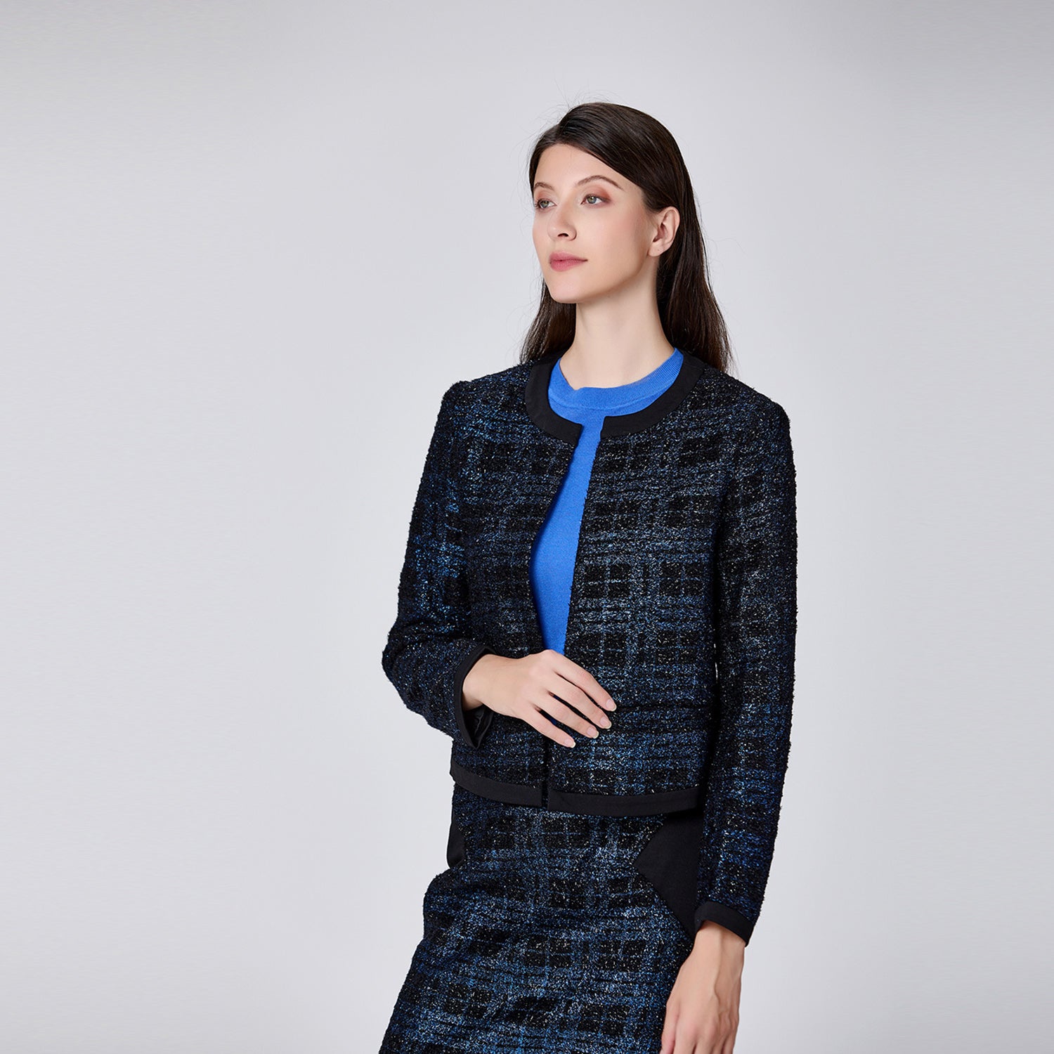 Veste courte minimaliste à motif carreaux