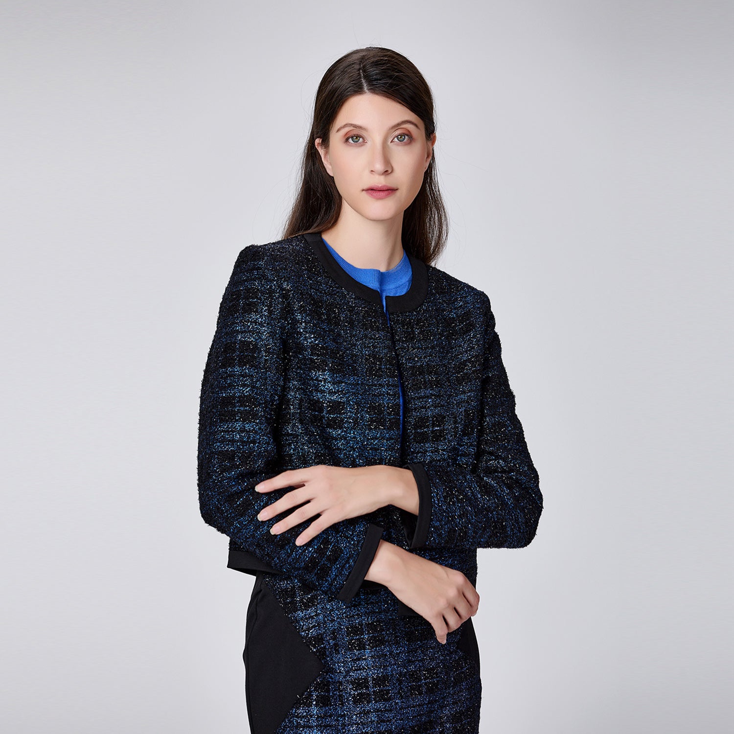 Veste courte minimaliste à motif carreaux