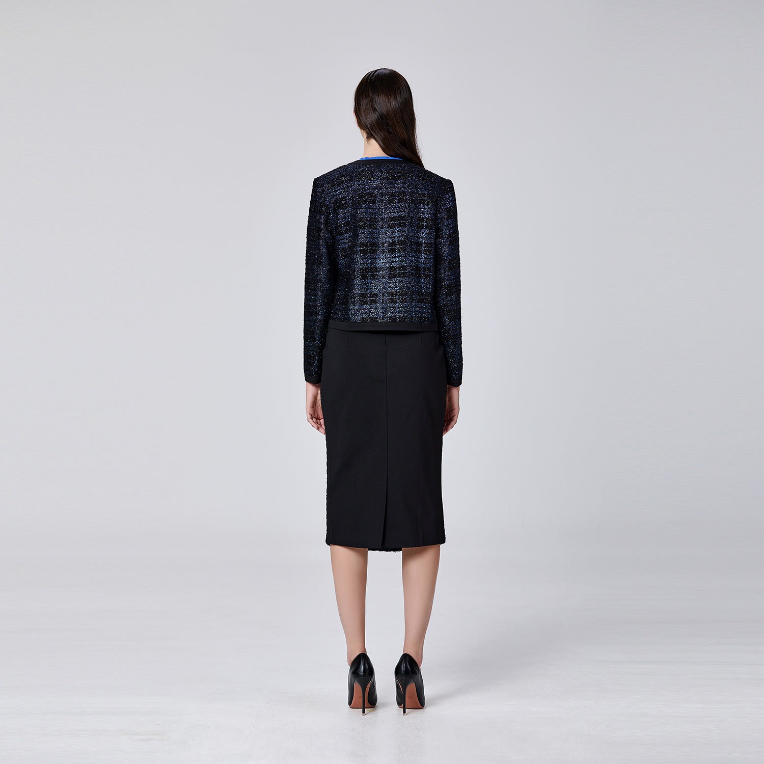 Veste courte minimaliste à motif carreaux