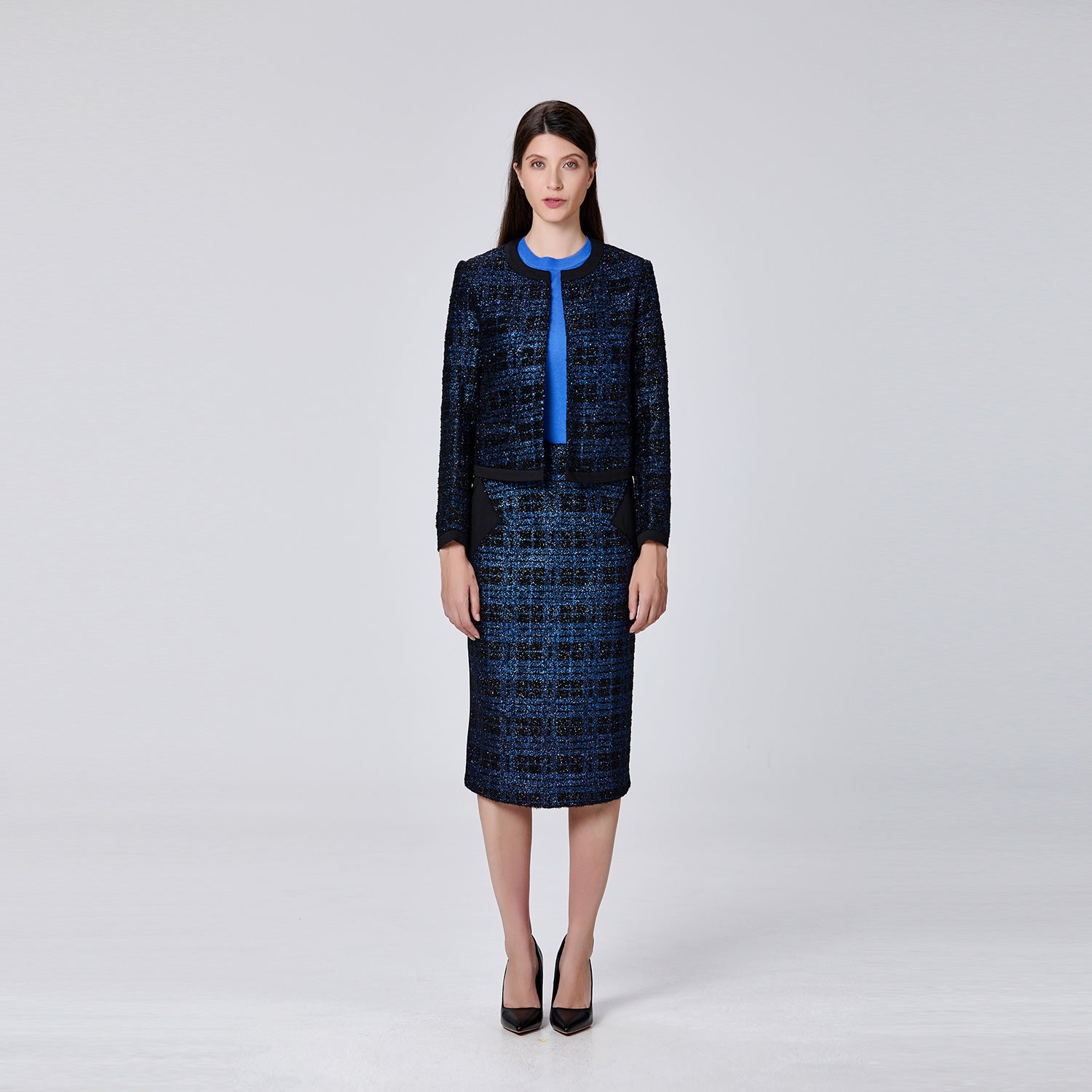 Veste courte minimaliste à motif carreaux