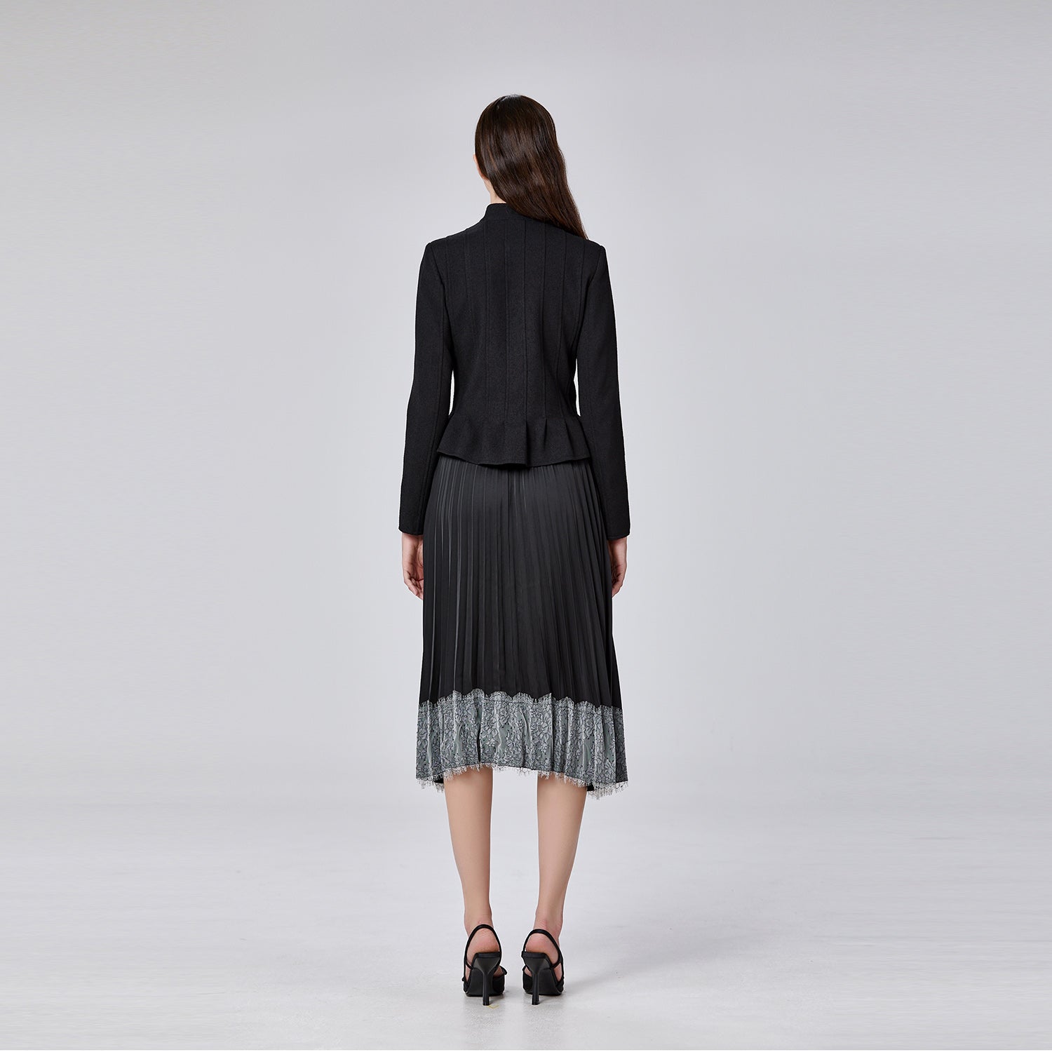 Blazer boutonné à col haut et basques