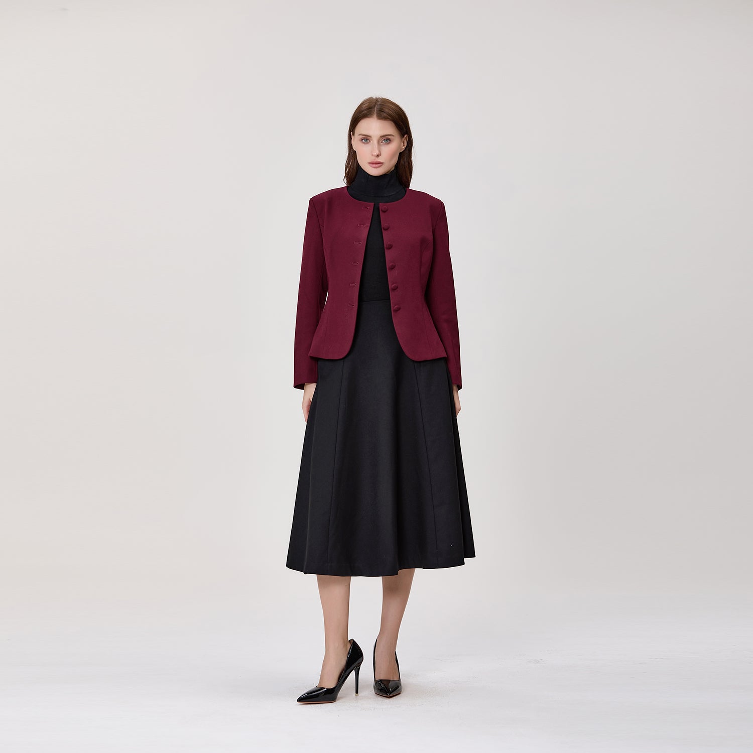 Veste cintrée à col montant et boutons recouverts