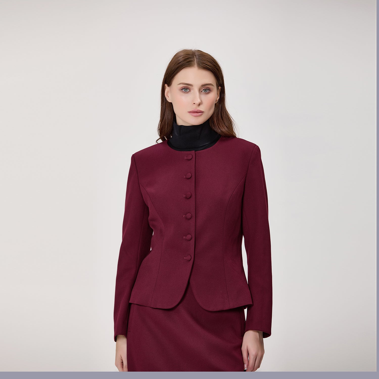 Veste cintrée à col montant et boutons recouverts