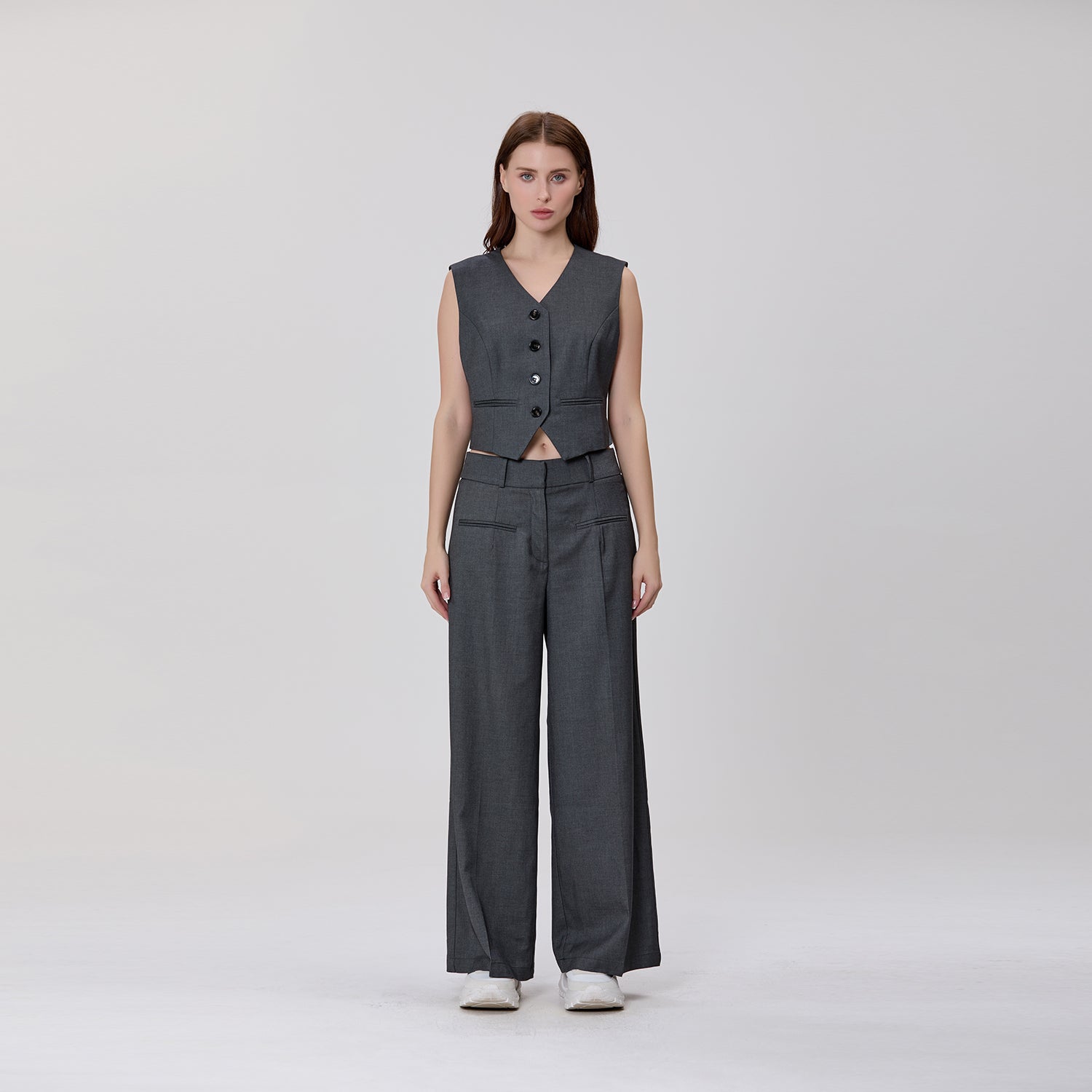 Gilet tailleur court sans manches à boutons