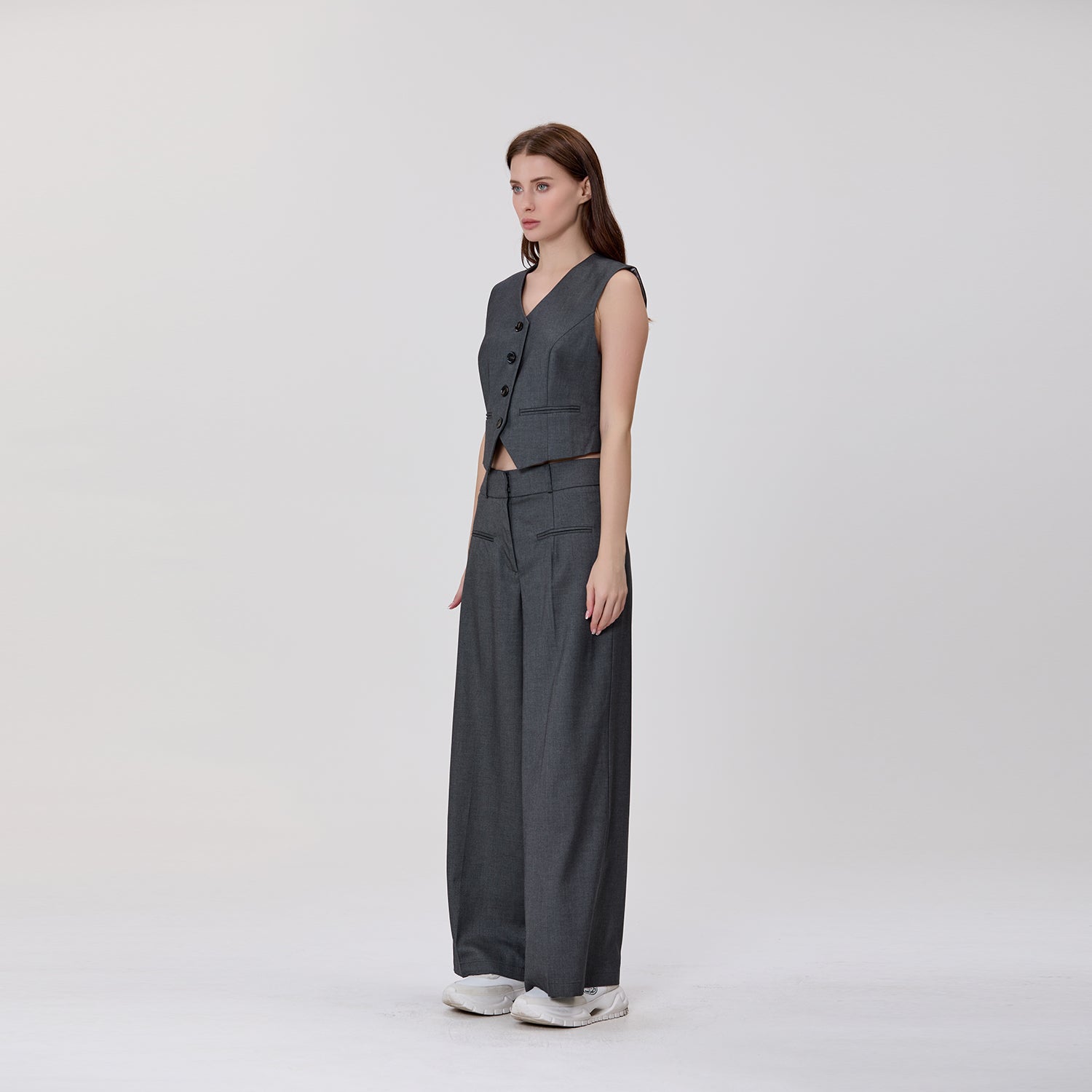 Gilet tailleur court sans manches à boutons