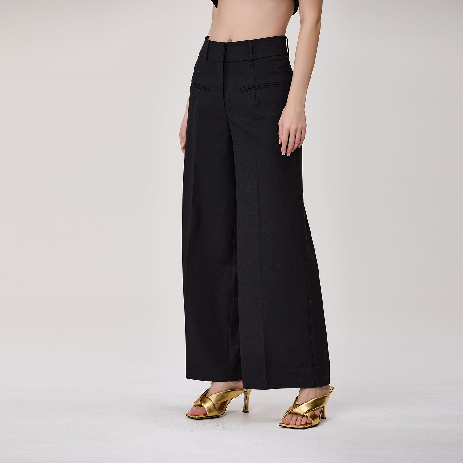Pantalon de tailleur large à plis